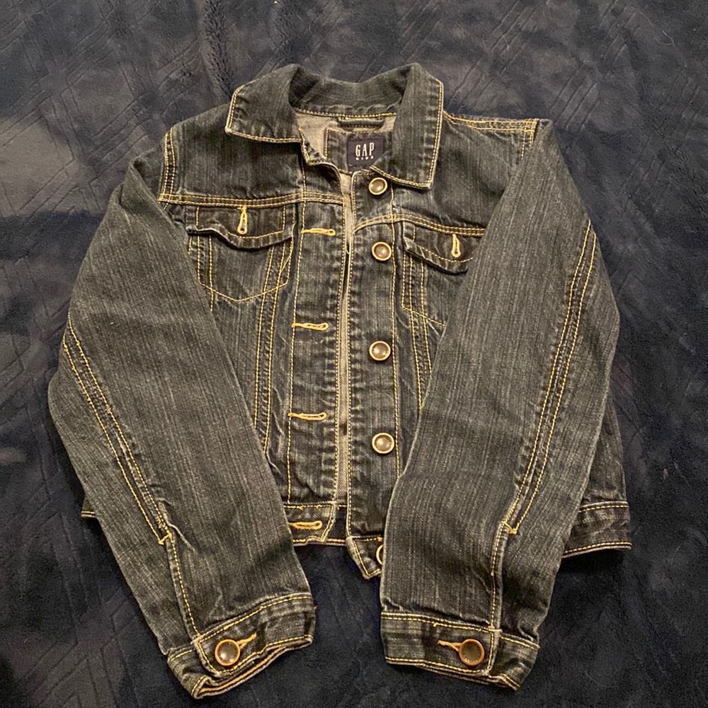 This super cute jacket has gotten so small so its ready to go to someone new